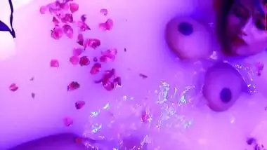 Bath with rose petals waits for the Desi seductress in the porn video