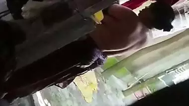 Son captures mom bathing in open backyard viral MMS