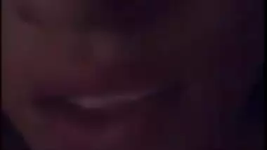 Young gal in red lingerie teases her XXX Desi pussy for the camera