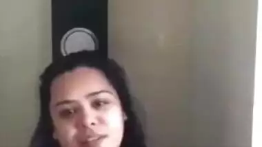 Gorgeous Desi aunty with huge XXX breasts fools around in bathroom