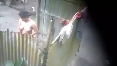 Neighbour village bhabhi bathing caught on camera