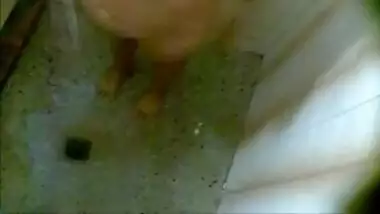 Desi love likes showering and doesn't pay attention to XXX camera